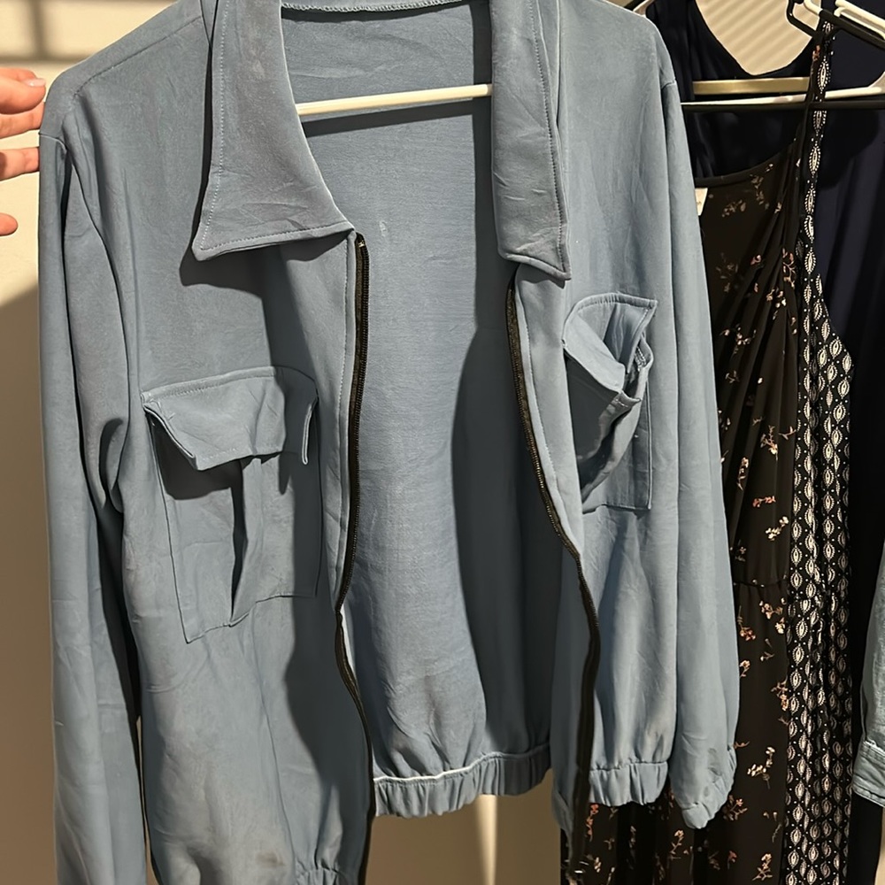 Blue zip up jacket